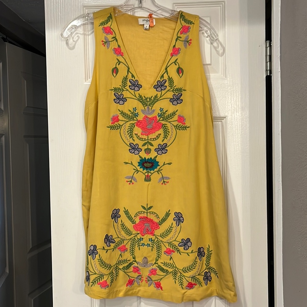 Umgee yellow dress with beautiful embroidery down the front and bottom. Sm.